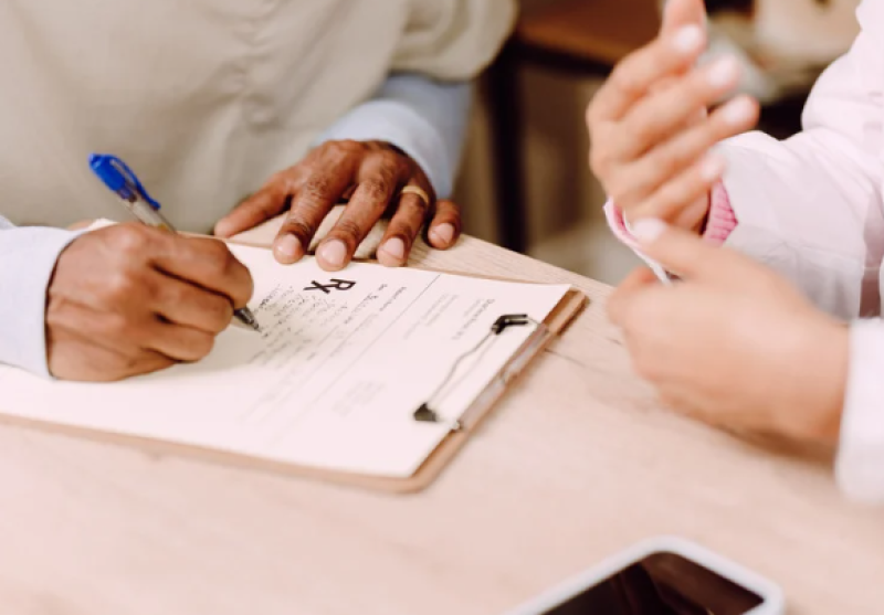 Doctor and patient developing a care plan together.