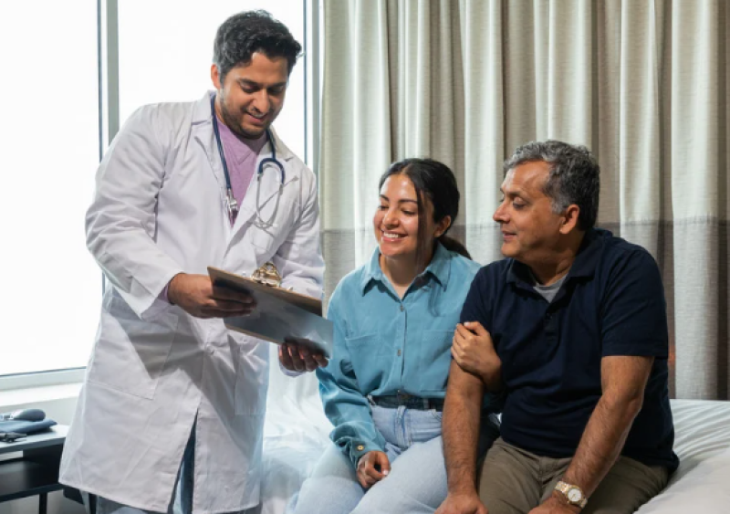 Doctor discussing a care plan with a patient and their family.