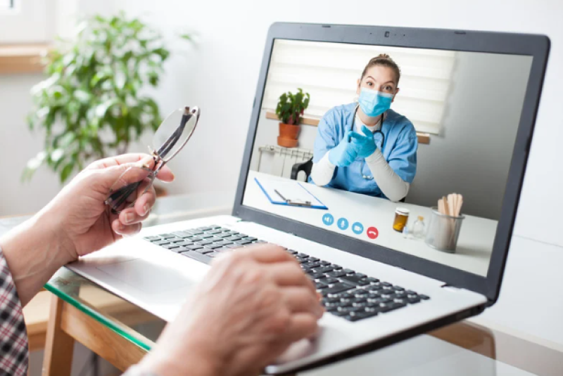 Patient on a video call with a doctor.