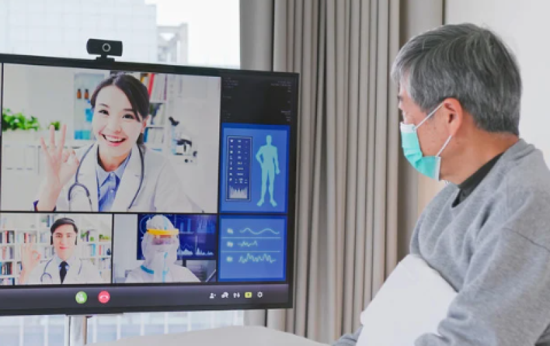Patient on a video chat with their doctor.