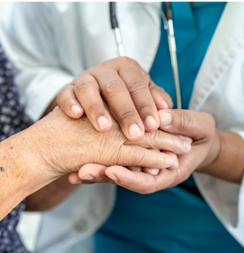 Therapist actively listening during a therapy session.